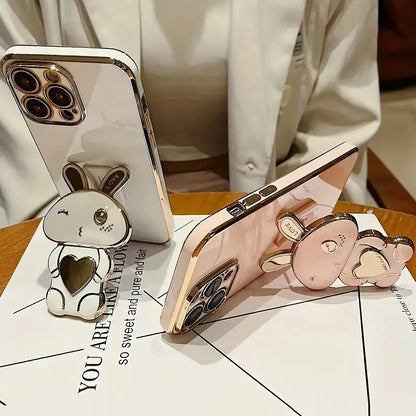 Designed for iPhone 11, iPhone 13, iPhone 14, iPhone 13 Pro Max, iPhone 14 Pro Max, iPhone 15, iPhone 15 Pro, iPhone 5 Pro Max, iPhone 16, iPhone 16 Pro, iPhone 16 Plus and iPhone 16 Pro Max Cute and Simple Electroplated Rabbit Holder Protective Case